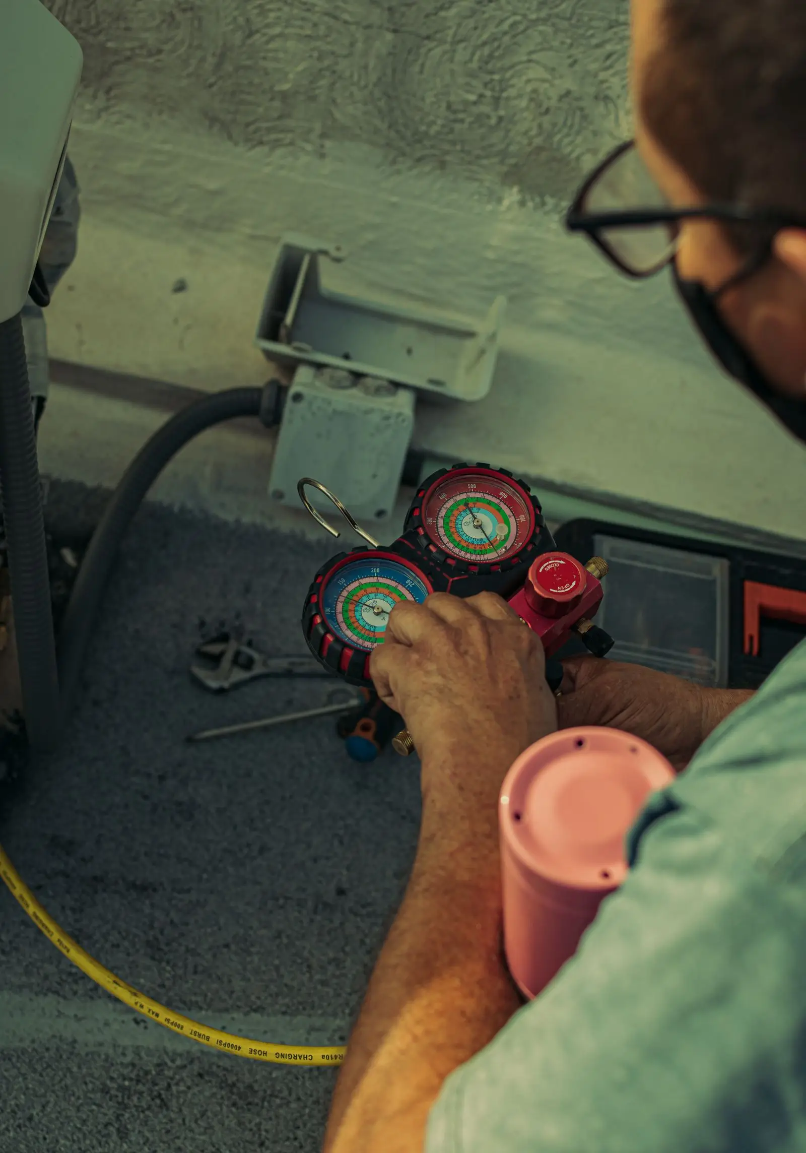 Close detail of a technician performing a tune-up